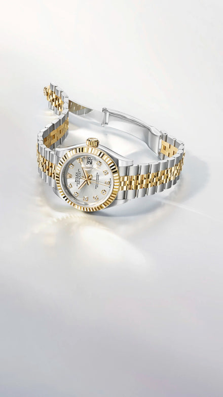 Two-tone Oystersteel and Gold Lady Datejust on a white background